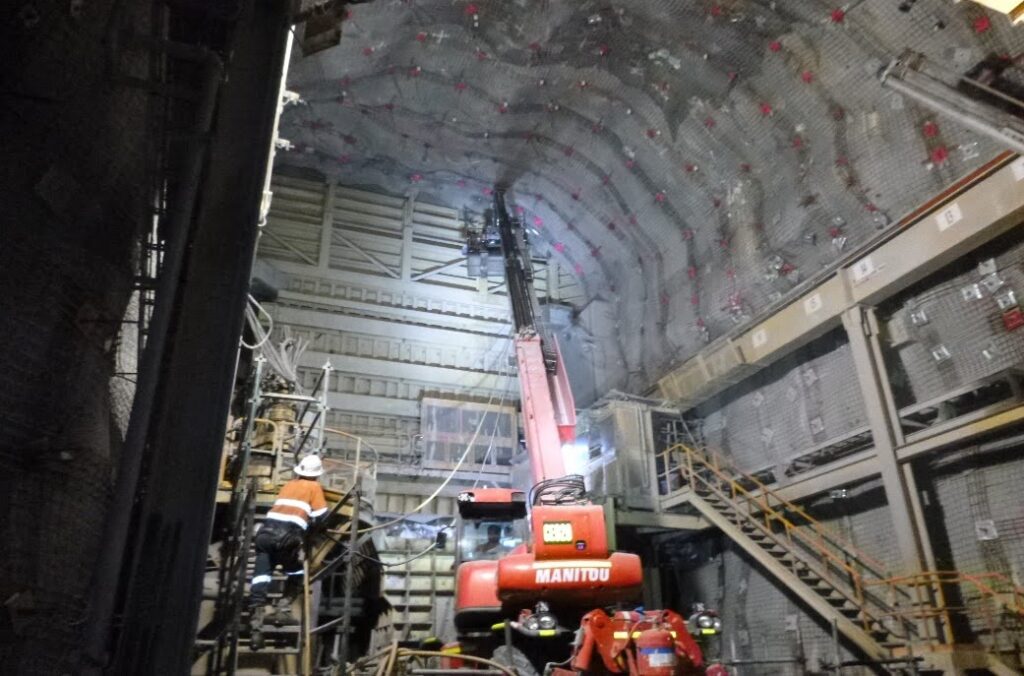 Cadia Ground Support - MCA operators injecting resin into the backs of PC1 crusher chamber